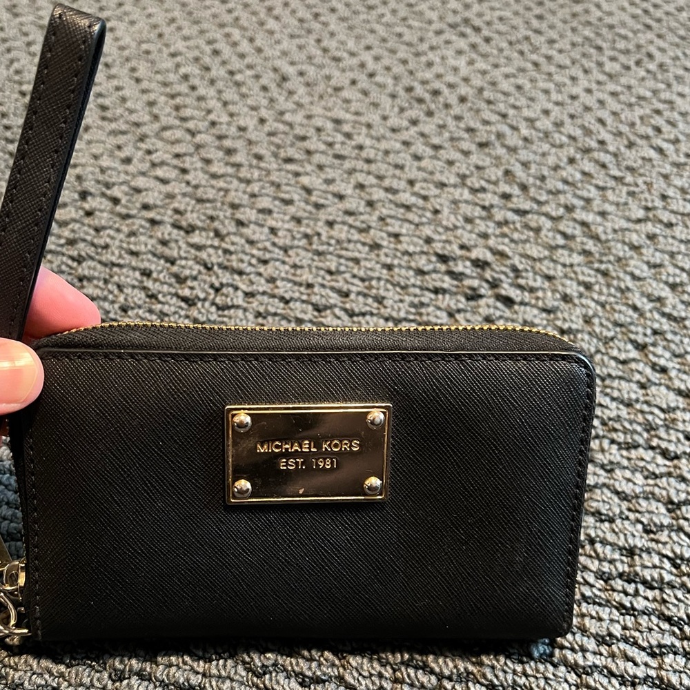 Black Michael Kors wallet with gold zipper